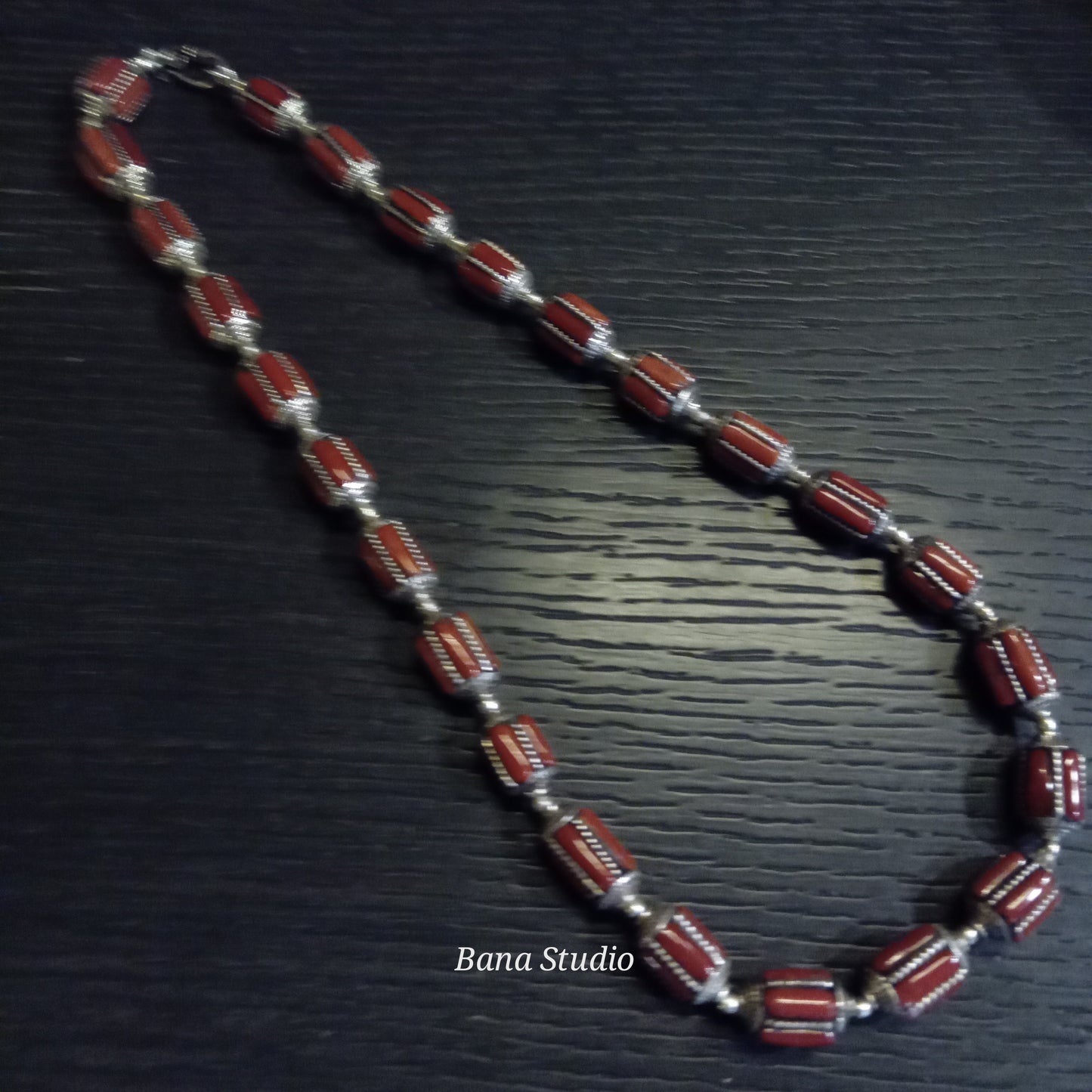Silver coral beads.