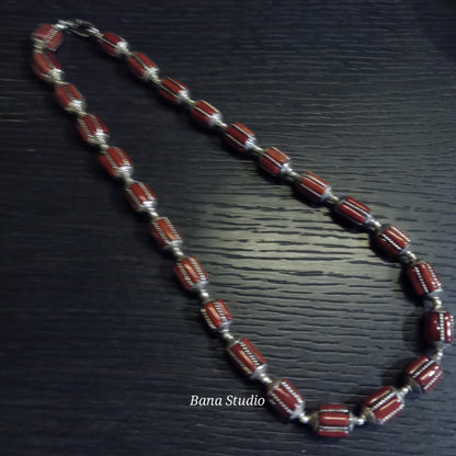 Silver coral beads.